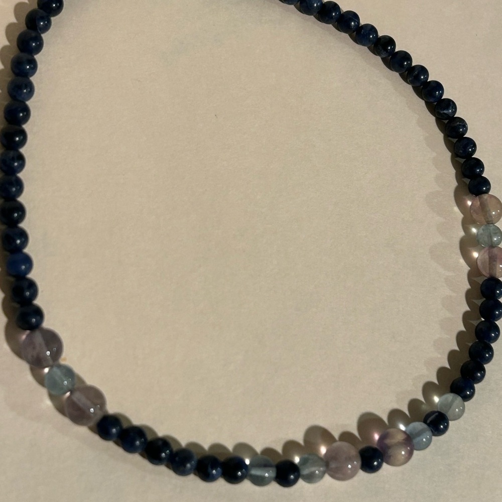 Blue and Purple Beaded Necklace with Polished Spherical Design